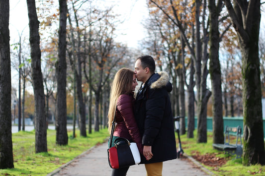 man and woman holding hands