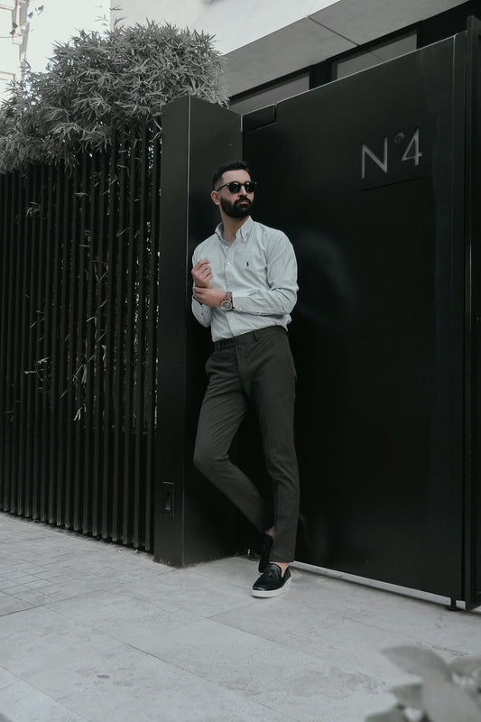 a man standing outside a building