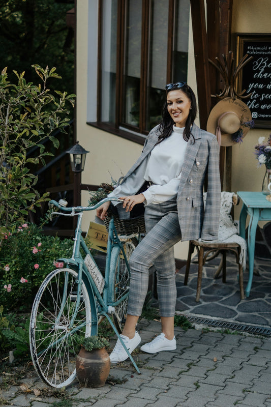 a person sitting on a bicycle