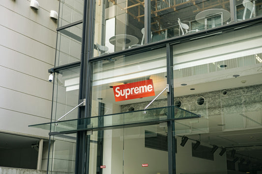 a store front with a sign that says supreme