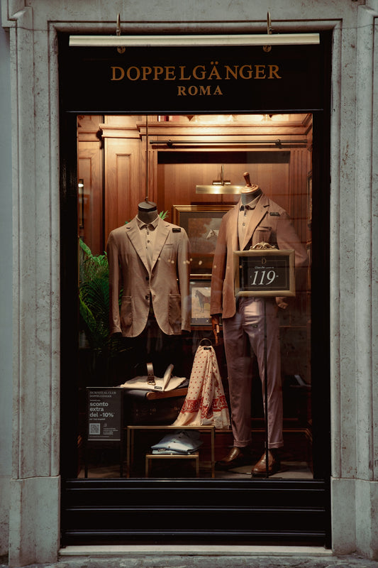 a window display of a man's suit and tie