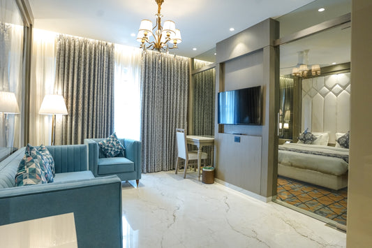 A luxurious hotel room with elegant furnishings.