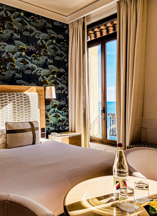 Elegant hotel room with a view of the sea.